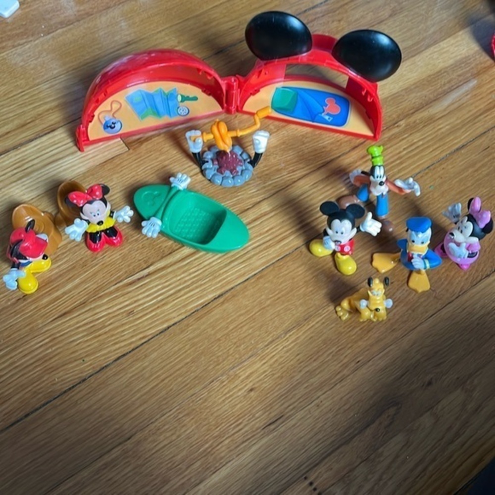 Disney Mickey Mouse camping play set plus additional figurine set gently used.